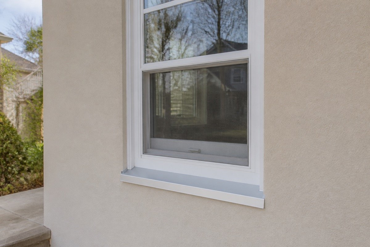 Window and door leak repair — single-family stucco home — after
